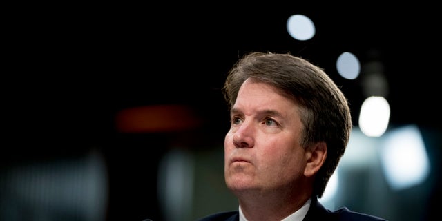 In this Sept. 5, 2018 photo, then Supreme Court nominee, Judge Brett Kavanaugh, pauses while testifying before the Senate Judiciary Committee on Capitol Hill in Washington.