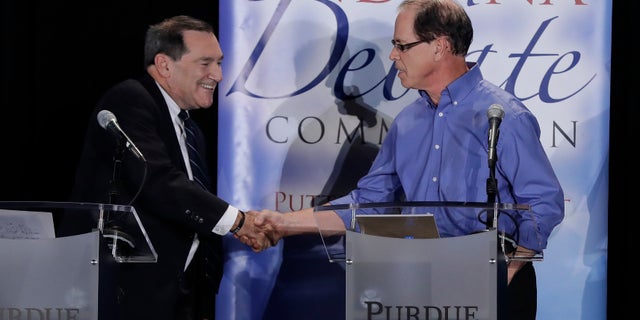 Incumbent Sen. Joe Donnelly has often criticized Republican nominee Mike Braun (right) for his company's use of foreign workers and imports.