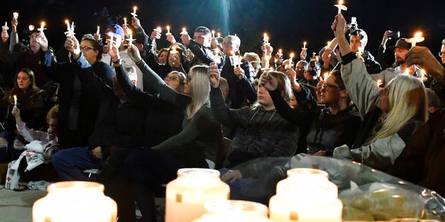 Family members and friends gathered for a candlelight vigil on Monday, to honor the 20 people who died in Saturday's fatal limo crash.