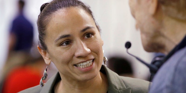Democratic congressional candidate Sharice Davids could become the first lesbian Native American woman ever elected to Congress.