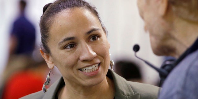 Democratic congressional candidate Sharice Davids could become the first lesbian Native American woman ever elected to Congress.