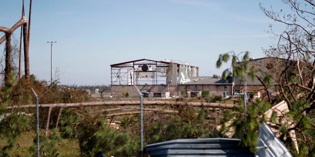 An airplane hanger at Tyndall Air Force Base is damaged from hurricane Michael.