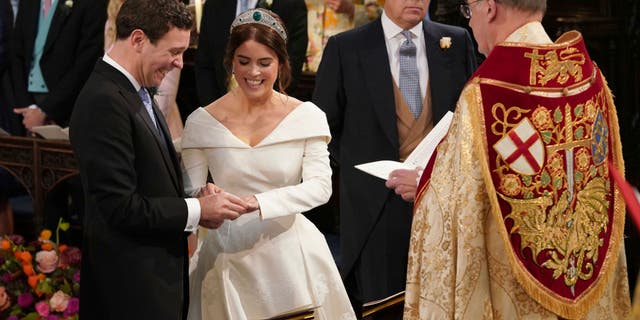 The Rt Revd David Conner, Dean of Windsor conducts the wedding ceremony between Princess Eugenie of York and Jack Brooksbank in St George’s Chapel, Windsor Castle, near London, England, Friday Oct. 12, 2018. (Jonathan Brady, Pool via AP)