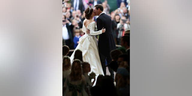 Princess Eugenie of York and Jack Brooksbank kiss after their wedding in St George’s Chapel, Windsor Castle, near London, England, Friday Oct. 12, 2018. (Yui Mok, Pool via AP)