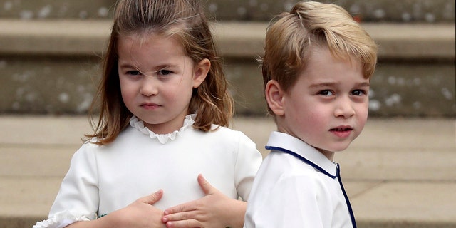 Prince George and Princess Charlotte arrive for the wedding of Princess Eugenie of York and Jack Brooksbank.