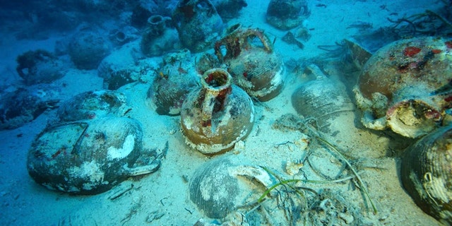 Items on the seabed from an ancient shipwreck discovered off the island of Fourni.