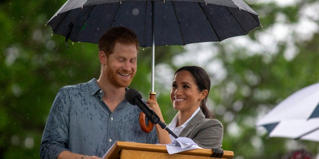 Britain's Prince Harry and Meghan Duchess of Sussex attend a community picnic at Victoria Park in Dubbo Australia Wednesday Oct. 17 2018