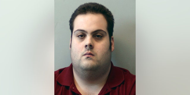 Daniel Frisiello, of Beverly, Mass., is accused of mailing five envelopes in February with threatening messages and a white substance, including one to Donald Trump Jr., that landed his wife, Vanessa, in the hospital. (Beverly Police Department via AP, File)