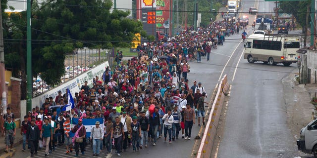 FILE: Honduran migrants walking to the U.S. start their day departing Chiquimula, Guatemala.