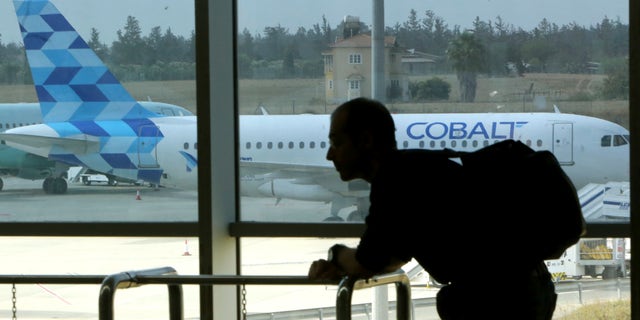 Cyprus-based airline Cobalt Air says it has indefinitely suspended all of its operations, Thursday, amid a struggle to find investors. (AP Photo/Petros Karadjias)