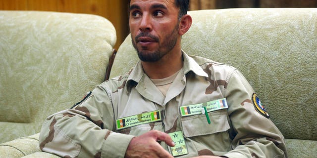 FILE: Gen. Abdul Raziq, Kandahar police chief, speaking with The Associated Press in Kandahar, Afghanistan.