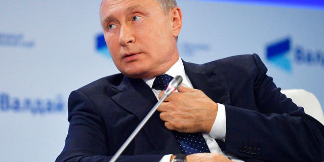 Russian President Vladimir Putin speaks at a meeting of the Valdai International Discussion Club in Sochi, Russia, on Thursday, Oct. 18