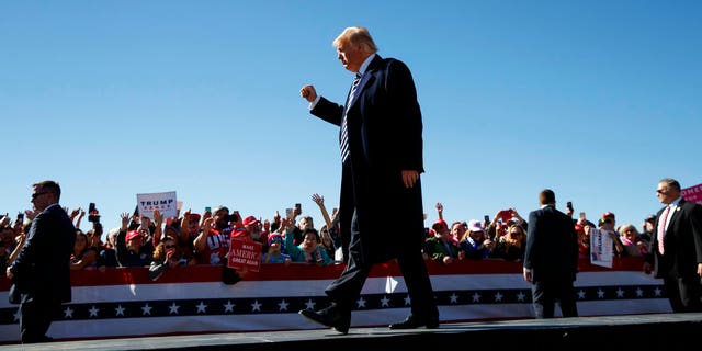 President Donald Trump walks from the stage at Elko Regional Airport, Saturday, He spoke about the INF treaty following his rally in Nevada.(AP Photo/Carolyn Kaster)