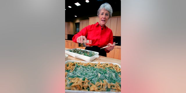 Reilly was a Campbell Soup kitchen supervisor in 1955 when she combined green beans and cream of mushroom soup, topped with crunchy fried onions, for an Associated Press feature. It is the most popular recipe ever to come out of the corporate kitchen at Campbell Soup. (AP Photo/Mel Evans, File)