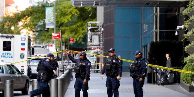 New York City Police Dept. officers arrive outside the Time Warner Center, in New York, Wednesday, Oct. 24, 2018.<br>
