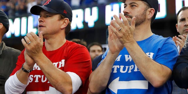 Matt Damon and Jimmy Kimmel watch Game 5 of the World Series baseball game between the Boston Red Sox and Los Angeles Dodgers on Sunday.
