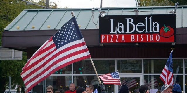 The front of La Bella Pizza Bistro in New Paltz, NY where hundreds in the community showed support for the proposed American flag mural.