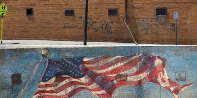 The current brick wall and the proposed American flag mural proposed for La Bella Pizza Bistro in New Paltz, NY.