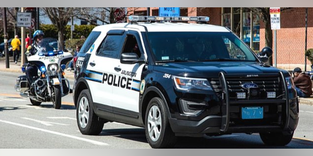 An Arlington police officer was placed on paid administrative leave for allegedly writing a series of controversial articles.