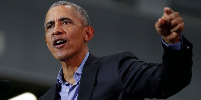 Former President Barack Obama speaks during a rally in Detroit on Friday.