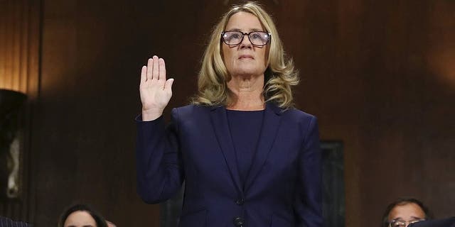 Christine Blasey Ford is sworn in before the Senate Judiciary Committee on Capitol Hill in Washington on Thursday, Sept. 27, 2018. (Win McNamee/Pool Photo via AP)