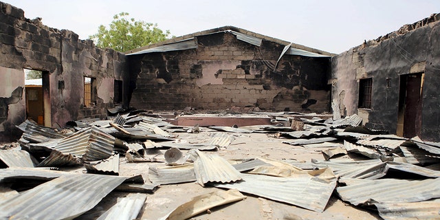 A church that residents say was burned by Boko Haram militants is seen in Damasak March 24, 2015. Boko Haram militants have kidnapped more than 400 women and children from the northern Nigerian town of Damasak that was freed this month by troops from Niger and Chad, residents said Tuesday. Nigerian, Chadian and Niger forces have driven militants out of a string of towns in simultaneous offensives over the past month. (REUTERS/Joe Penney)