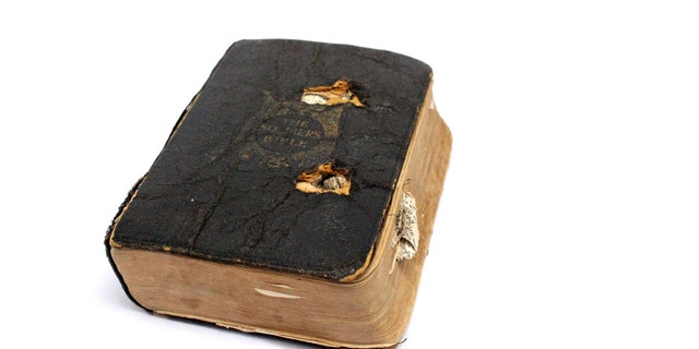 Private Leslie Friston's bullet-scarred Bible, which he brought with him when World War I ended.