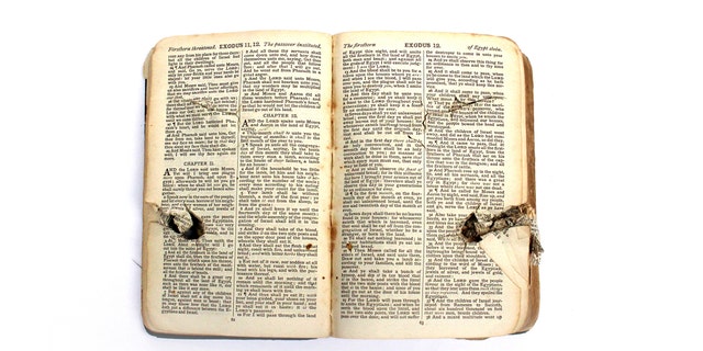 The Bible was damaged when a German plane machine-gunned a makeshift hospital.