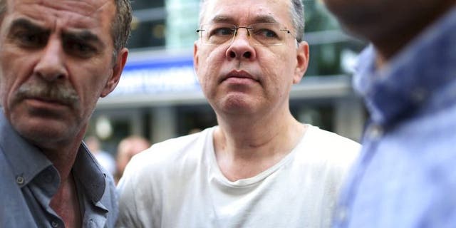 Andrew Brunson, an evangelical pastor from Black Mountain, North Carolina, is placed under house arrest in Izmir, Turkey, on July 25, 2018. (AP Photo/Emre Tazegul)