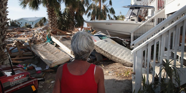 Luke Bryan's mother oversees the damage to her home after Hurricane Michael.
