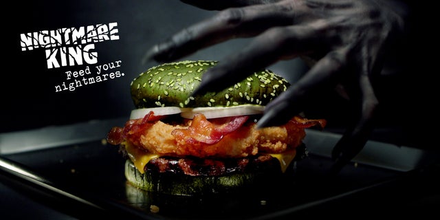 Burger King is releasing a green burger stuffed with chicken, beef and bacon just in time for Halloween.