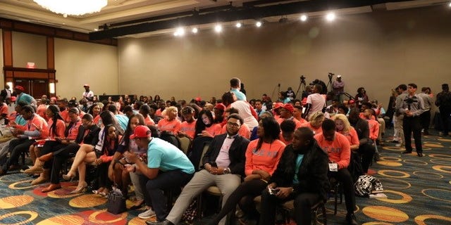 Attendees of the Blexit announcement await the "Black State of the Union" speech delivered by Candace Owens, as she announced "Blexit." (Christopher Howard/Fox News).