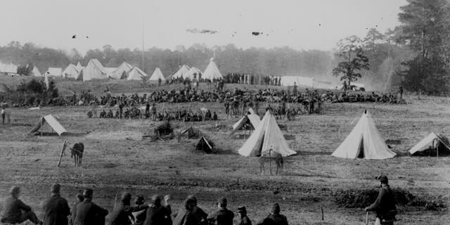 File photo - Confederate prisoners under guard during the Civil War