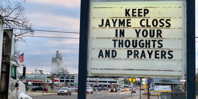 A sign is seen in the small town of Barron, Wis., Tuesday, Oct. 23, 2018, where 13-year-old Jayme Closs was discovered missing Oct. 15 after her parents were found fatally shot at their home. A search was being organized to find the couple's missing daughter. (AP Photo/Jeff Baenen)
