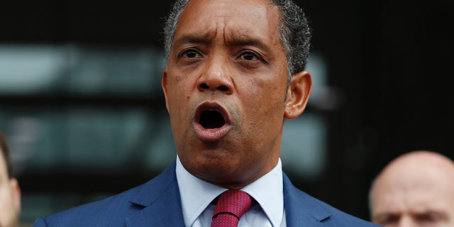 FILE - In this Oct. 5, 2017, file photo, District of Columbia Attorney General Karl Racine speaks at One Judiciary Square in Washington. Racine announced Tuesday, Oct. 23, 2018, that his office will open an investigation into sexual abuse by Catholic clergy in the local archdiocese. (AP Photo/Carolyn Kaster, File)