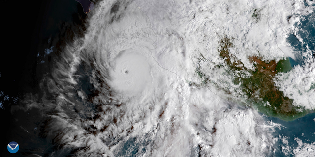 This GOES East satellite image provided by NOAA shows Hurricane Willa in the eastern Pacific, on a path toward Mexico's Pacific coast on Monday, Oct. 22, 2018. (NOAA via AP)
