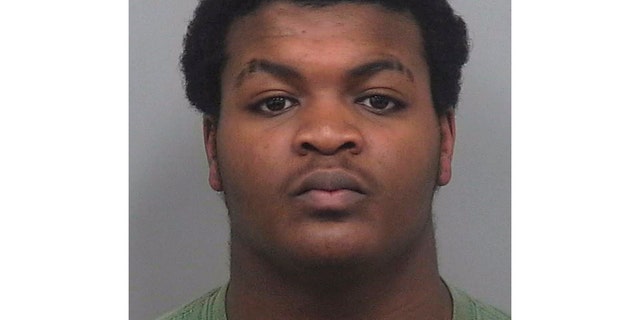 This undated photo provided by Gwinnett County Police Department shows Tafahree Maynard. A police officer on Monday, Oct. 22, 2018, shot and killed Maynard man accused of fatally shooting another officer, Antwan Toney, near a school in the Atlanta area over the weekend, police said. (Gwinnett County Police Department via AP)
