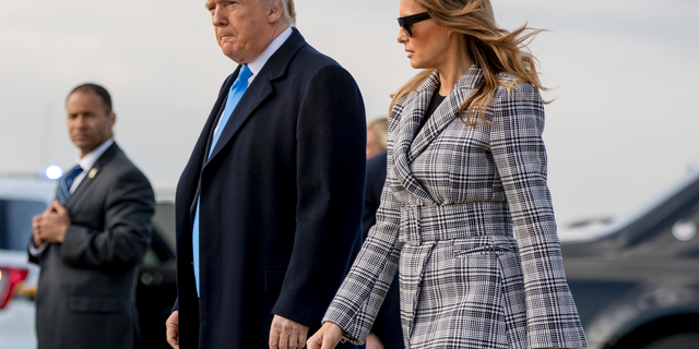 President Donald Trump and first lady Melania Trump arrive at Pittsburgh International Airport in Coraopolis, Pa., Tuesday, Oct. 30, 2018, following last weekends shooting at Tree of Life Synagogue in Pittsburgh. (AP Photo/Andrew Harnik)