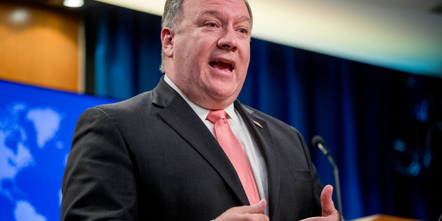 In this Oct. 23, 2018 photo, Secretary of State Mike Pompeo speaks to reporters at a news conference at the State Department in Washington. The Trump administration is calling for a halt to the civil war in Yemen, including airstrikes by the Arab-led coalition supported by the United States. Pompeo is urging all parties to support U.N. Special Envoy Martin Griffiths in what Pompeo says must be "substantive consultations" in November in a third country. (AP Photo/Andrew Harnik)