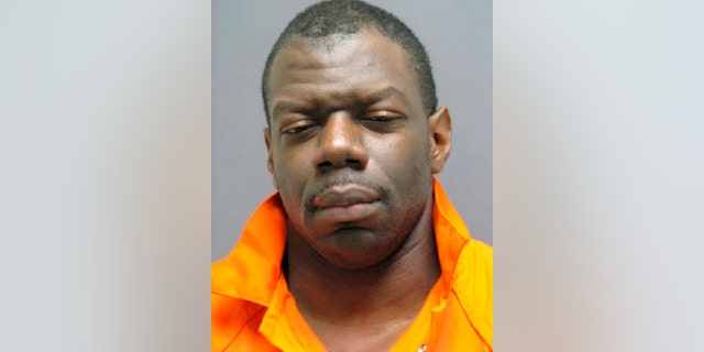 FILE - In this February 2016 photo provided by the Prince William County, Va. Police shows Ronald Hamilton.  A jury has spared the life of Hamilton, convicted of fatally shooting his wife and a rookie police officer who responded to her call for help. The decision Thursday, Oct. 25, 2018,  by the jury in Manassas means that Hamilton will serve life in prison without possibility of parole for the deaths of his wife, Crystal Hamilton, and Officer Ashley Guindon, who was working her first shift after being sworn in. (Prince William County Police via AP, File)