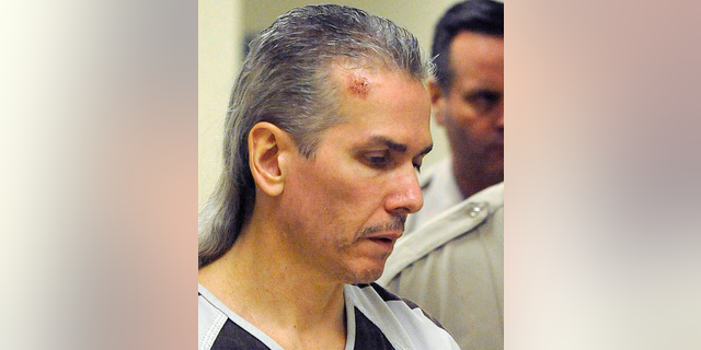 FILE - In this April 13, 2011 file photo, Rodney Berget, who was convicted of killing a Sioux Falls prison guard during an escape attempt, is escorted to court in Sioux Falls, S.D. South Dakota has set Monday as the execution date for Berget. Berget is one of two inmates convicted in the 2011 killing of guard Ronald Johnson during a failed escape attempt at the state prison in Sioux Falls. The other inmate, Eric Robert was executed by lethal injection in 2012. (Elisha Page/Argus Leader via AP, File)