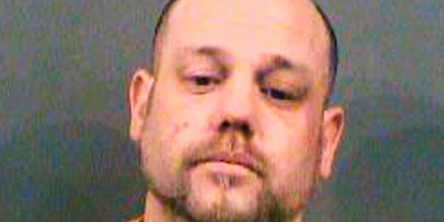 FILE - This file photo provided by the Sedgwick County Sheriff's Office in Wichita, Kan., shows Stephen Bodine, of Wichita, who was convicted Wednesday, Oct. 24, 2018, of first-degree murder in the May 2017 killing of a 3-year-old Evan Brewer whose body was found encased in concrete in the laundry room of his home four months after his death. (Sedgwick County Sheriff's Office via AP, File)