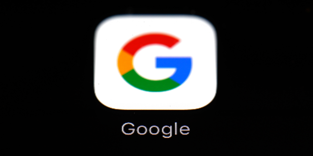 FILE - This March 19, 2018, file photo shows the Google app on an iPad in Baltimore. Google will give away $25 million to projects that propose ways to use the artificial intelligence of computers to help create a more humane society. The grant program announced Monday, Oct. 29, is part of a broader Google initiative called "AI for Social Good" aimed at easing concerns that advances in artificial intelligence will eliminate jobs and perhaps even be autonomously deployed by militaries to kill people. (AP Photo/Patrick Semansky, File)