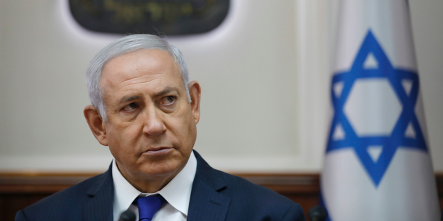 Israel Prime Minister Benjamin Netanyahu attends the weekly cabinet meeting at his office in Jerusalem, Israel, Sunday Oct. 7, 2018. (Abir Sultan/Pool via AP)