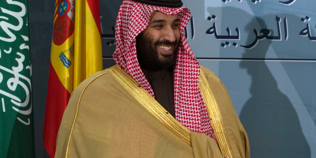 FILE - In this April 12, 2018, file photo, Saudi Crown Prince Mohammed bin Salman prepares to leave after a signing ceremony with Spain's Prime Minister Mariano Rajoy in Madrid, Spain. The killing of Saudi journalist Jamal Khashoggi at the kingdom’s consulate in Istanbul on Oct. 2, 2018, is unlikely to halt Salman’s rise to power, but could cause irreparable harm to relations with Western governments and businesses, potentially endangering his ambitious reform plans. (AP Photo/Paul White, File)