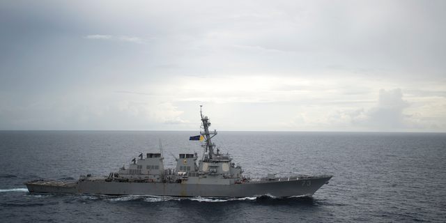 In this Oct. 13, 2016, photo provided by the U.S. Navy, guided-missile destroyer USS Decatur operates in the South China Sea as part of the Bonhomme Richard Expeditionary Strike Group.