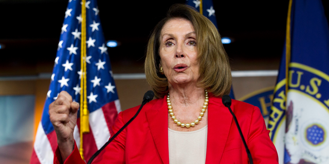 FILE - In this Sept. 6, 2018, file photo. House Minority Leader Nancy Pelosi, D-Calif., speaks during her weekly news conference on Capitol Hill in Washington. Just ahead of a midterm election they hope will deliver them a majority, House Democrats are promising to prioritize anti-discrimination legislation that would for the first time establish widespread equal rights protections for LGBTQ individuals. Pelosi says she will introduce the Equality Act as one of her first orders of business if Democrats retake the House in November. (AP Photo/Jose Luis Magana, File)