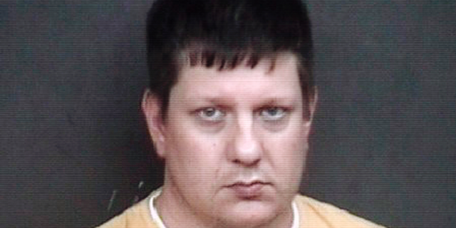 FILE - This undated file photo provided by the Rock Island, Ill., Sheriff's Department shows Chicago police Officer Jason Van Dyke. Van Dyke is returning to court for the first time since a jury found him guilty this month in the 2014 shooting death of Laquan McDonald. He won't be sentenced during a hearing Wednesday, Oct. 31, 2018, but the judge might set a sentencing date. (Rock Island Sheriff's Department via AP, File)