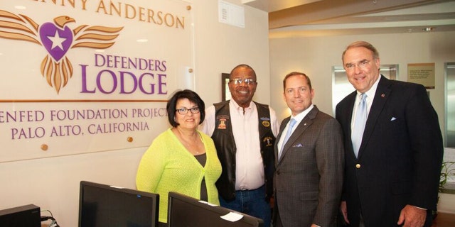 Elena and Billy Bryels (Veteran); James Schenck, President and CEO of PenFed Credit Union and Mark D. Smith, Director of Programs, PenFed Foundation tour the Lee & Penny Anderson Defenders Lodge.