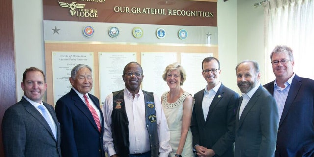 James Schenck, President and CEO of PenFed Credit Union; Honorable Frederick F.Y. Pang, Chairman of the PenFed Foundation, Billy Bryels, Veteran; Lisa Freeman, former Director/CEO, VA Palo Alto Health Care System; Assembly Member Marc Berman (24th District); State Senator Jerry Hill (13th District); William Ball, Chief, Voluntary & Hospital Services, VA Palo Alto Health Care System at the Lee & Penny Anderson Defenders Lodge.